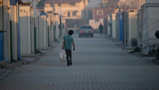 Monday's explosion was the seventh car bomb blast in Manbij in just over a month, said Munir Mustafa, the deputy director of civil defense.(AFP) Monday's explosion was the seventh car bomb blast in Manbij in just over a month, said Munir Mustafa, the deputy director of civil defense.(AFP)